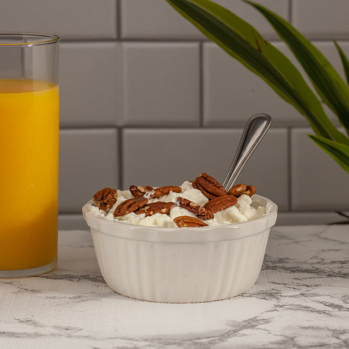 Organic Pecans in a bowl of yogurt