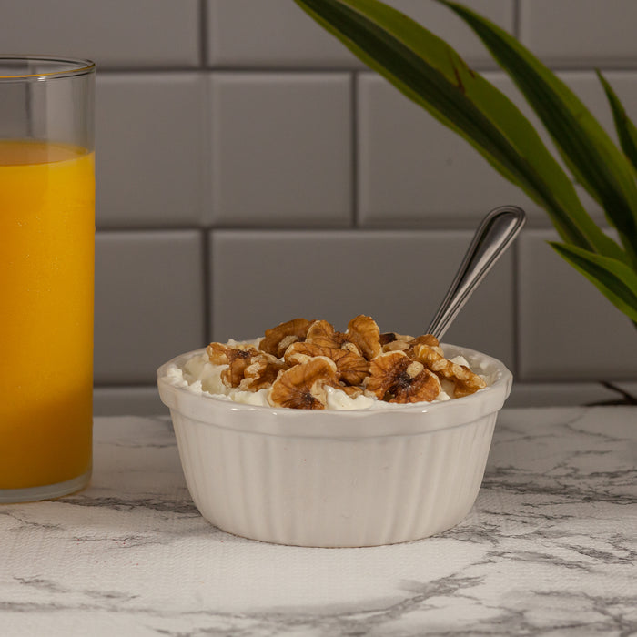 Organic Walnuts and yogurt in a bowl